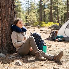 Traveler comparing the best travel credit cards with built-in travel insurance